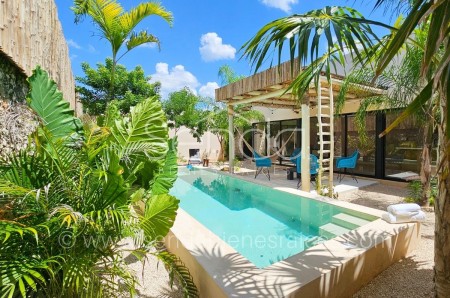 Paradisíaca casa en venta de una planta en Cholul Merida con Canal de Nado